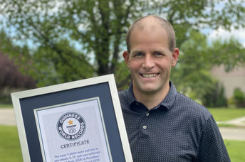 David Rush with a Guinness World Record certificate.