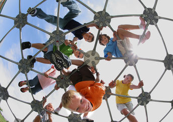 Elementary school students on play structure