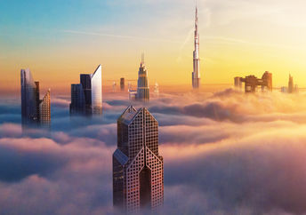 Dubai downtown at sunset covered with clouds