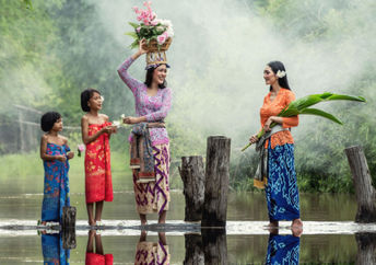 Balinese women preparing a traditional offering.