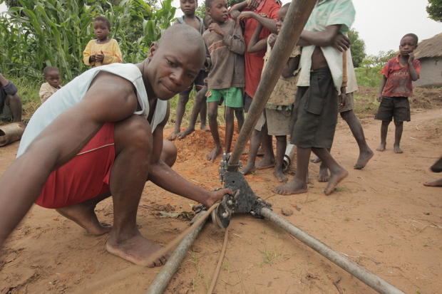 Jimmy, one of Water4's drill team leaders in Zambia, working on well components