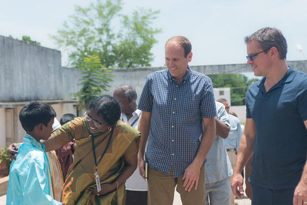 White and Damon meeting members of small communities in India (Water.org)