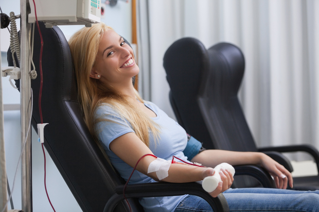 Woman donating blood.