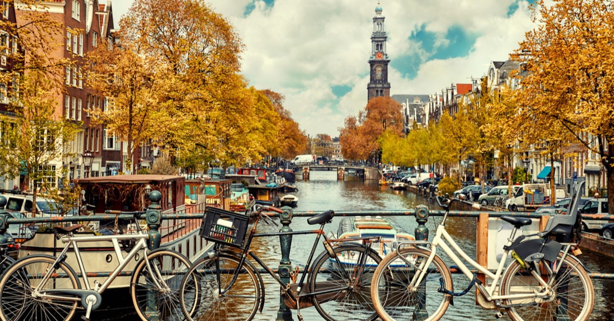 Bicycles stand on a bridge in Amsterdam