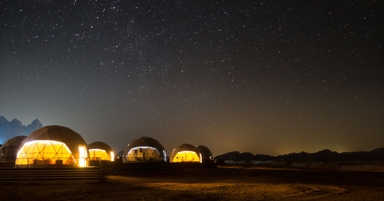 Stars above martian dome tents in Wadi Rum Desert, Jordan