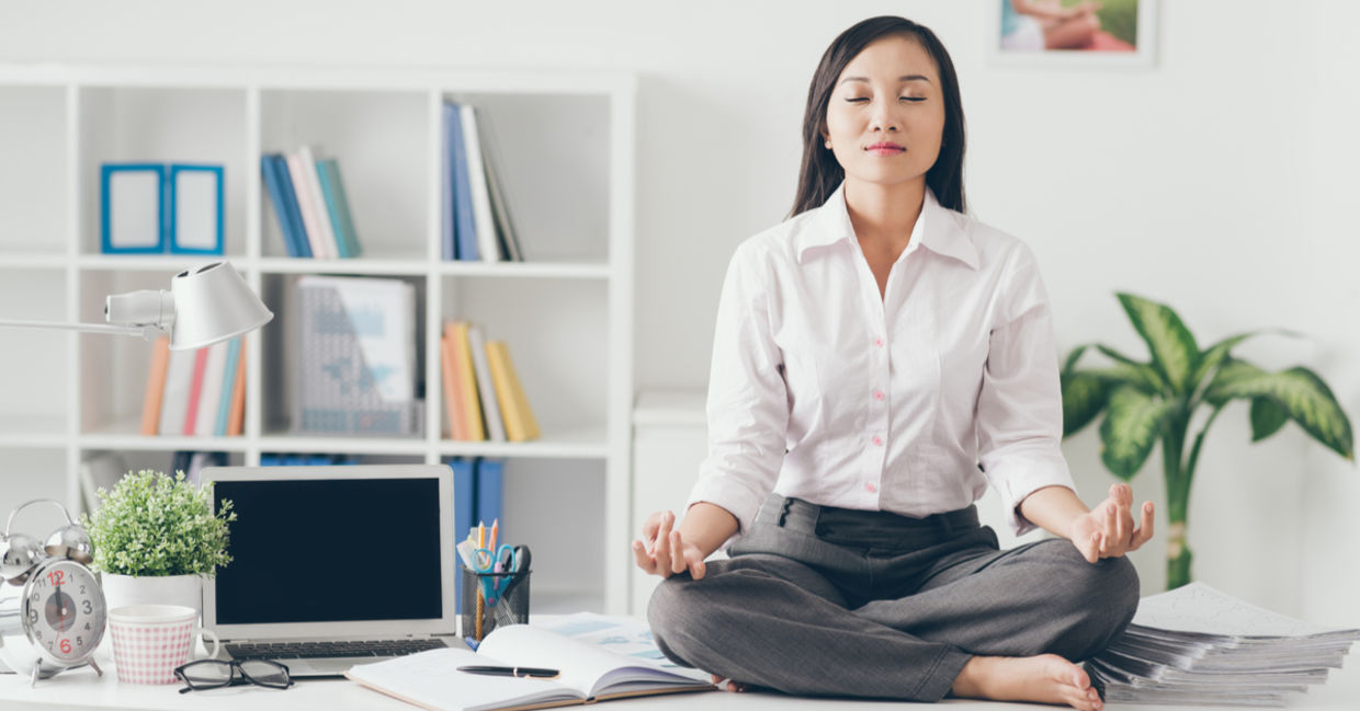 Meditating during your lunch break increases productivity, reduces stress. (Shutterstock)