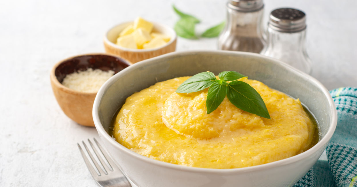 Hearty and satisfying sous vide polenta is served with parmesan and fresh parsley.