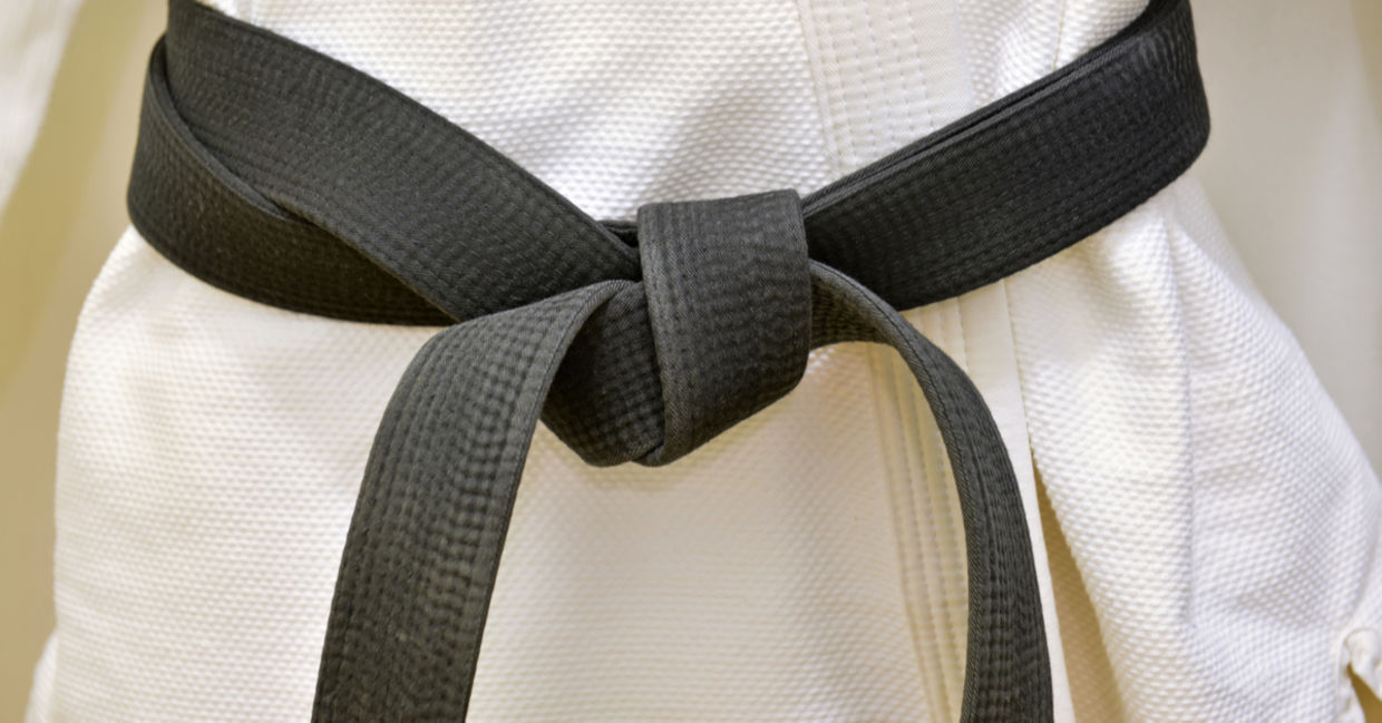 A karate black belt can be earned through excellence.