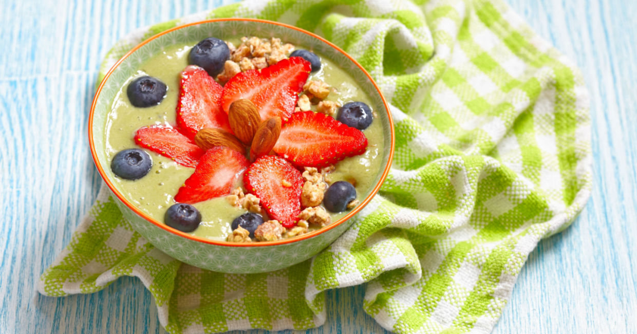 Healthy breakfast contains matcha, yogurt, and fruit.