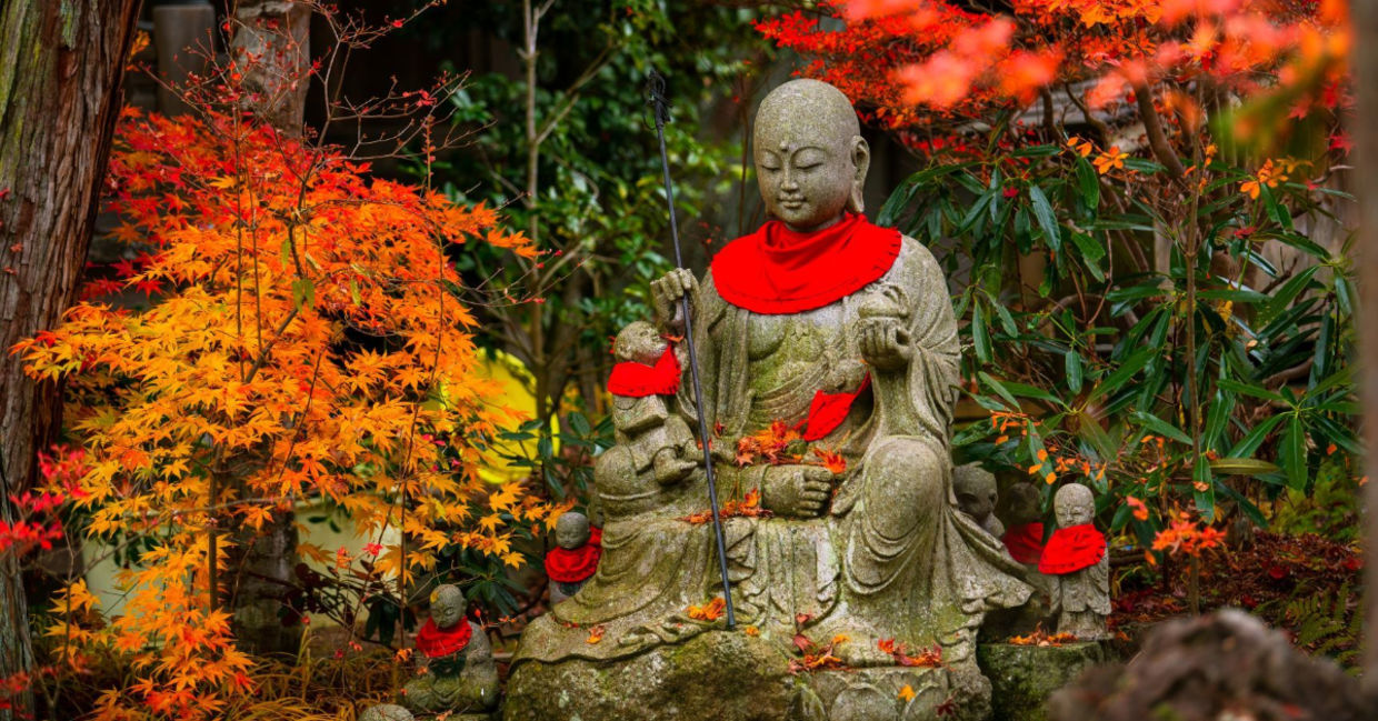 Jizo statue in autumn garden of Sanboin Temple on Mount Koyasan.