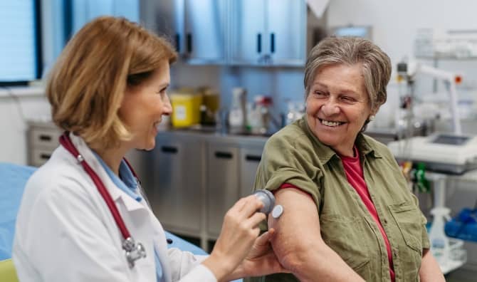 Doctor treating a diabetic patient.