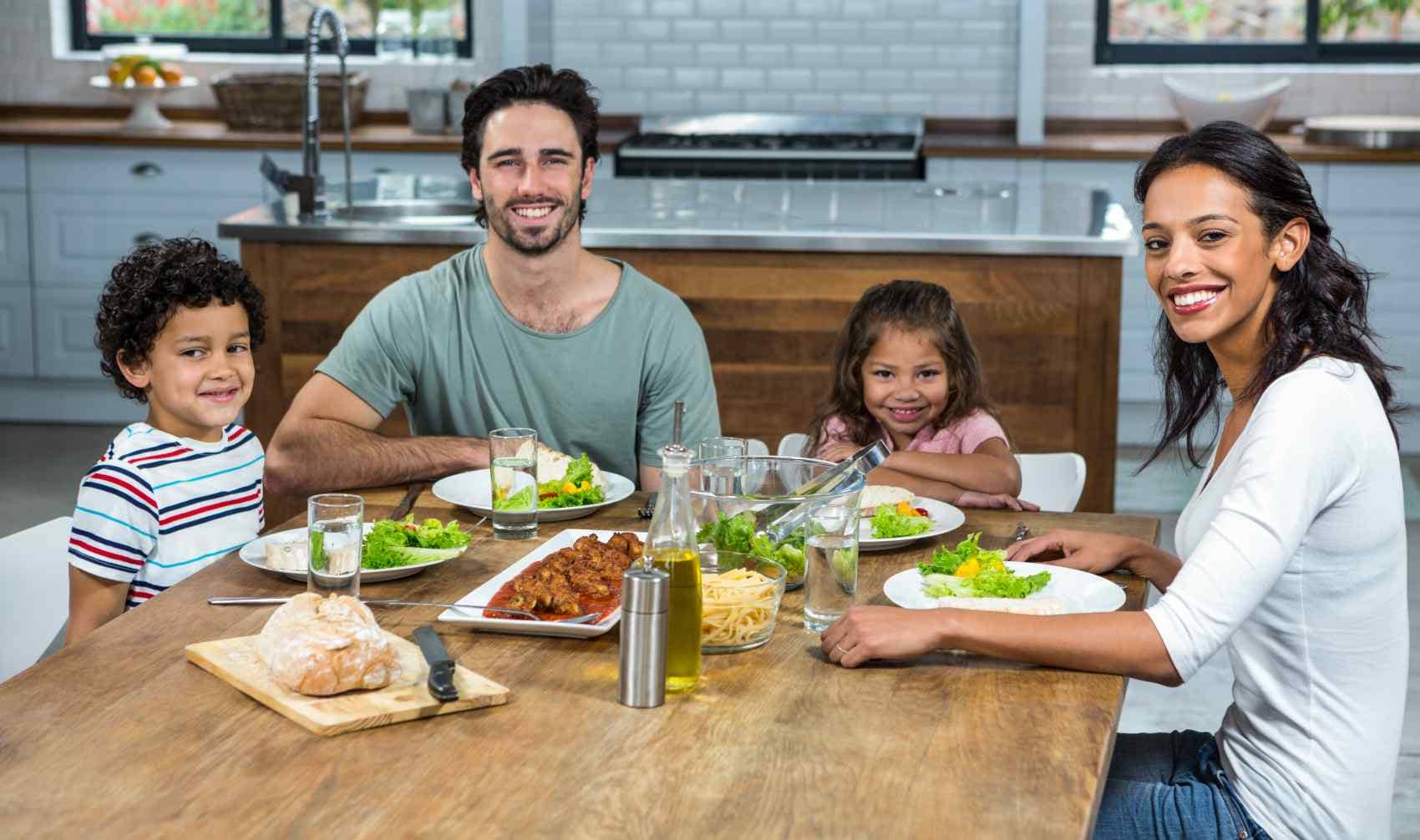 Family eating an early dinner.