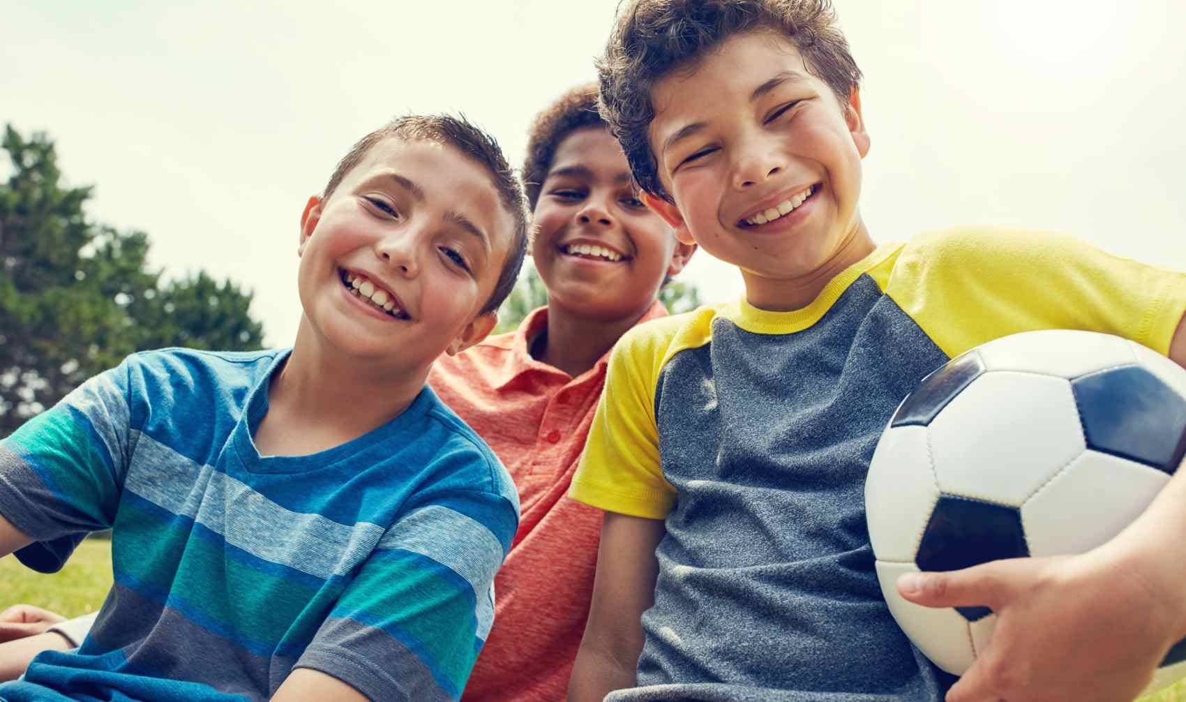 Children playing soccer.