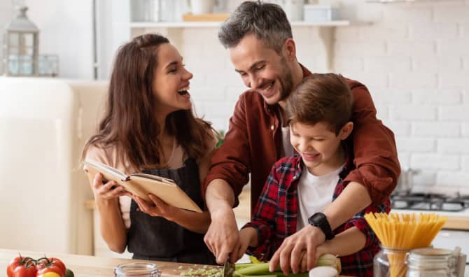 Family cooking a healthy meal.