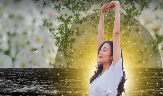 A woman meditating.