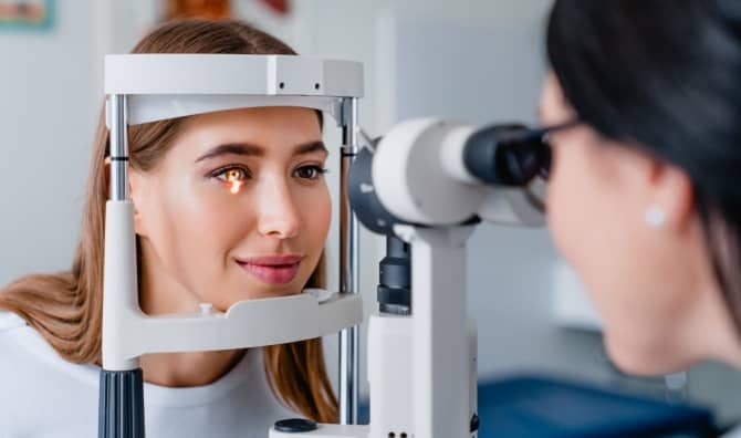 Checking a woman’s eyes.