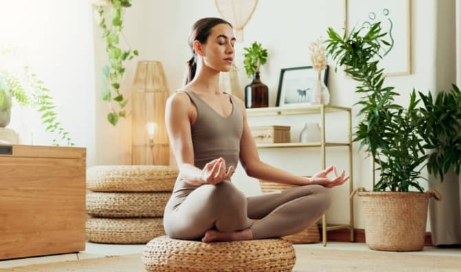 Meditating at home.