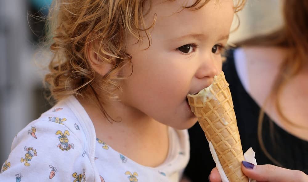 A child’s ice cream treat brings happiness.