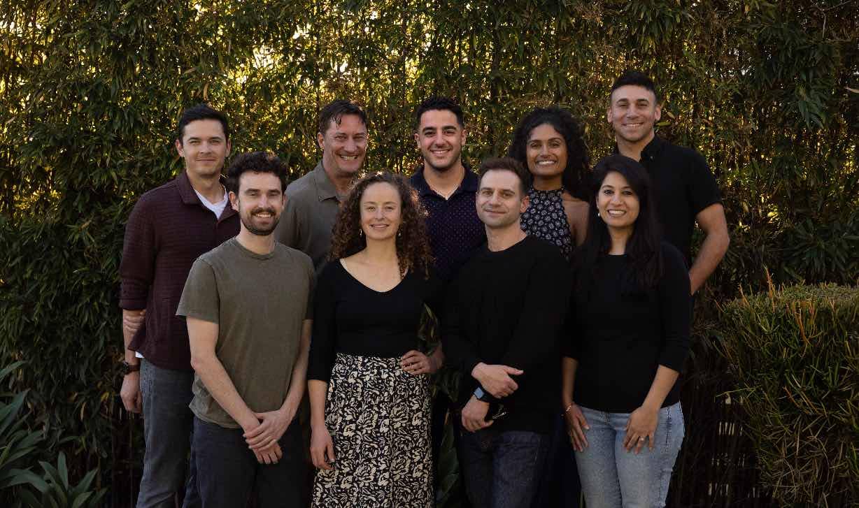 The World Within team poses for a picture.