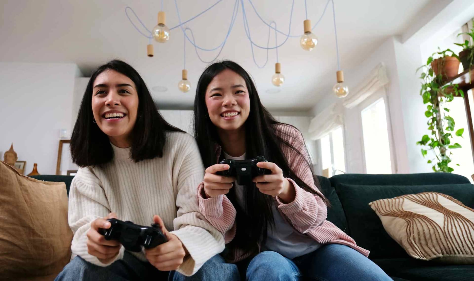Two girls playing video games.