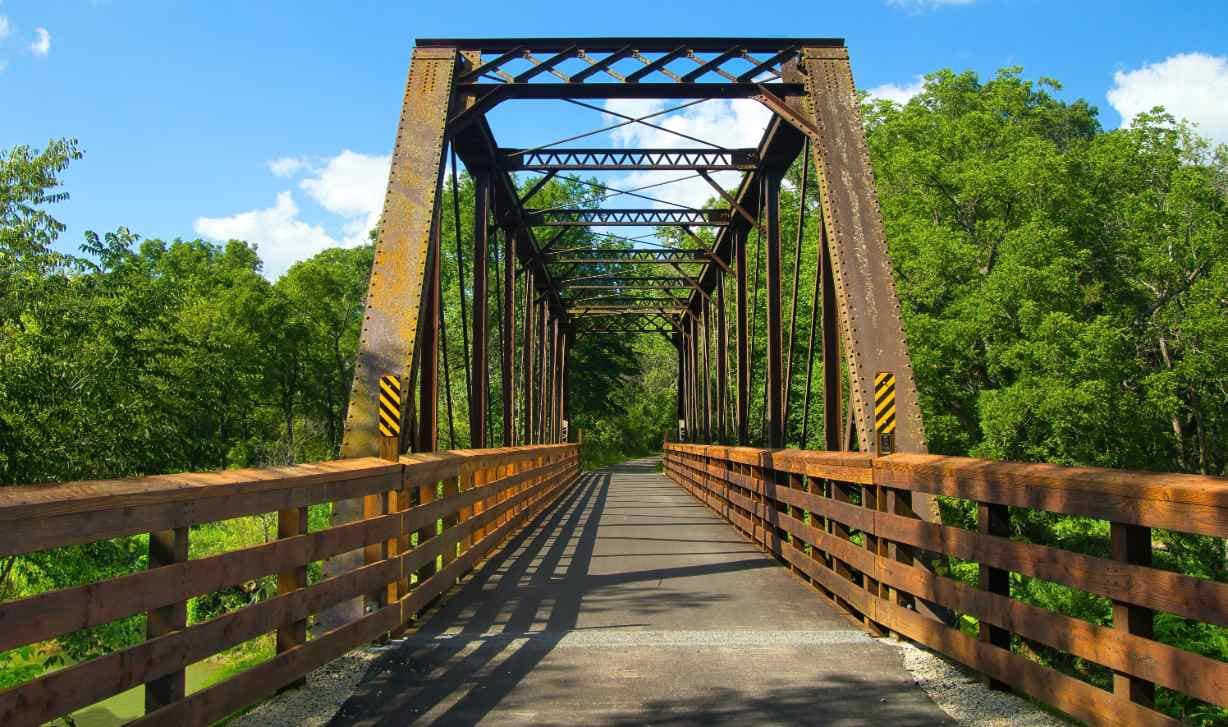 Bike trail passing over an old railroad trestle.