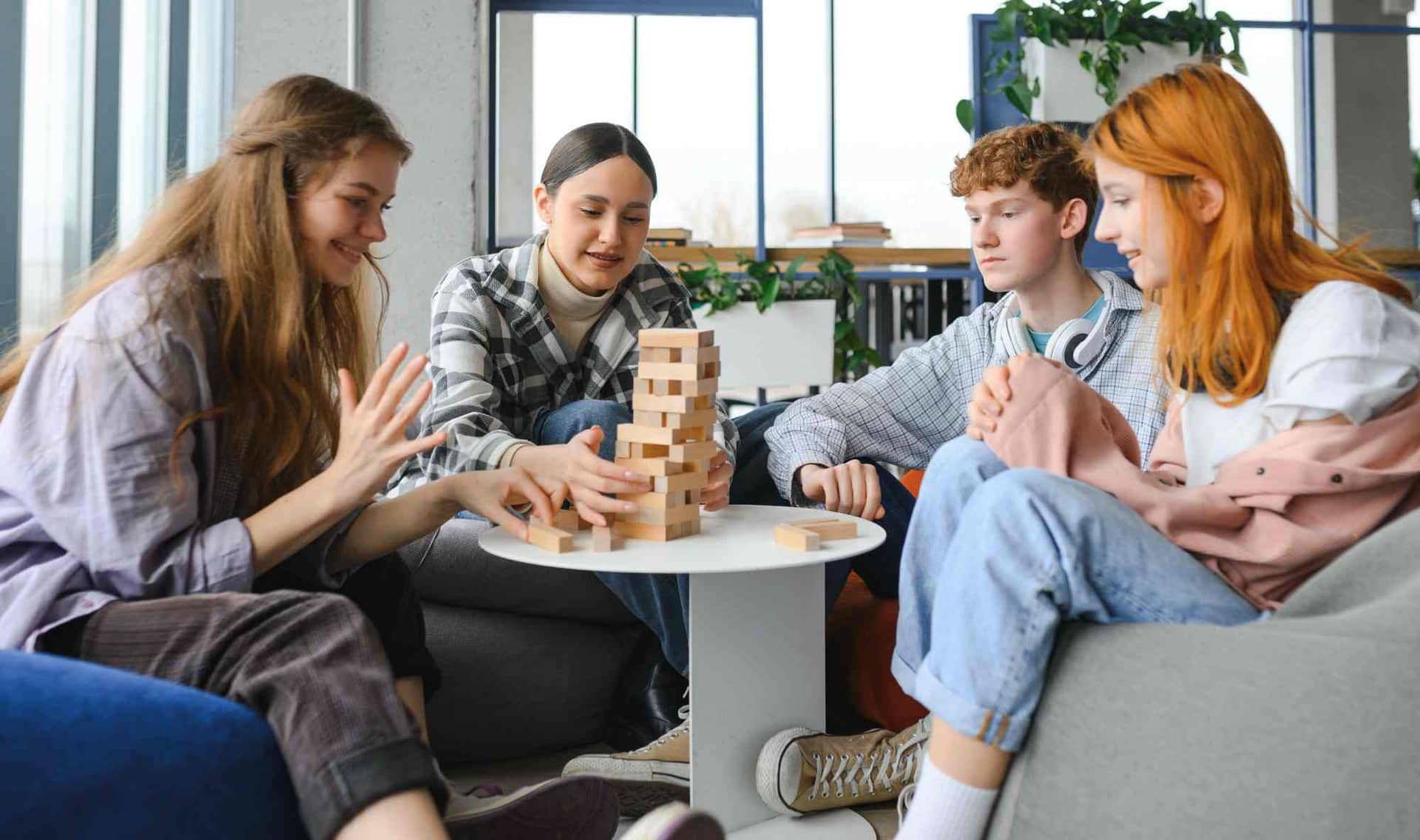 Friends playing Jenga.