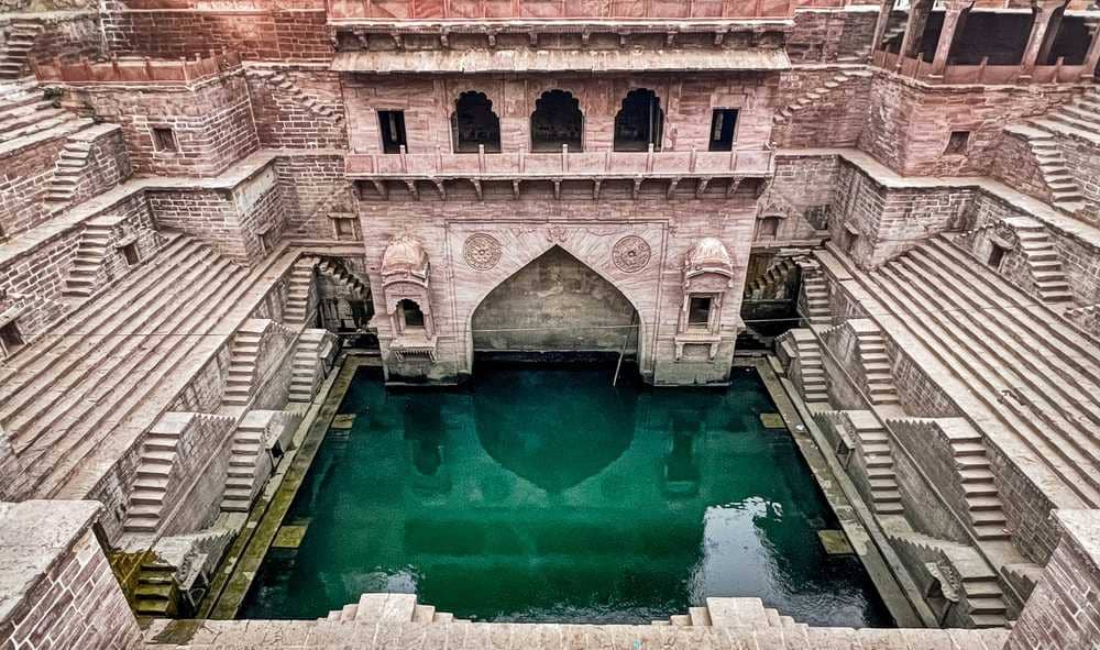 A wide view of the Toorji Ka Jhalra Bavdi stepwell in the center of Jodhpur in Rajasthan.