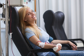 Woman donating blood.