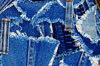 Denim scraps showing repurposed old clothes