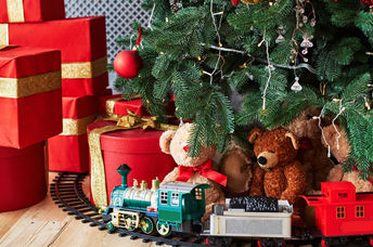 Toys under Christmas tree.