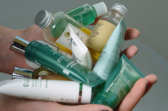 Mini-toiletry bottles like these will be phased out.