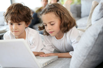 Kids playing 'a computer game.