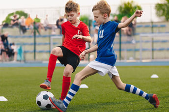 Kids playing sports.