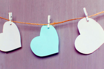 Paper hearts signifying kindness in the community