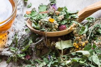 Dried herbs and flowers used to prepare herbal teas.