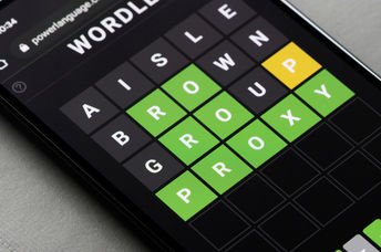 Playing a Wordle puzzle on a smartphone.