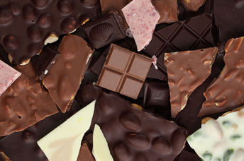 Chocolate bar pieces in various flavors.
