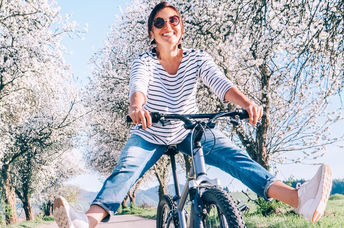 Happy and thriving  woman out in nature.