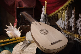 Musical still life in the Renaissance style with lute and flutes.