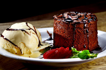 Mouthwatering vanilla ice cream and chocolate cake