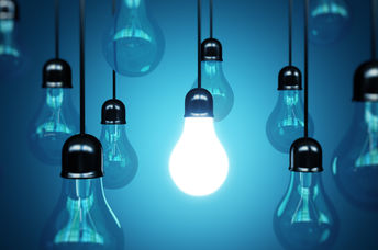 Idea concept with light bulbs to show inspiring innovation.