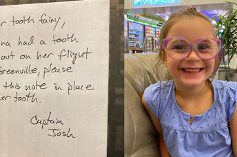 Lena and the note for the tooth fairy.