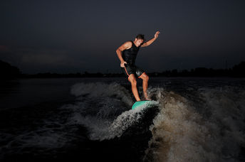 Surfing on a wakeboard.
