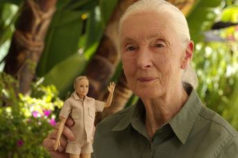 Jane Goodall holding the Jane Barbie doll.