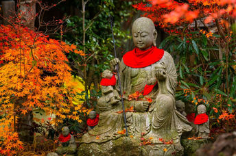 Jizo statue in autumn garden of Sanboin Temple on Mount Koyasan.