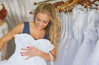 Woman choosing her wedding dress.
