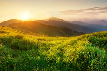 Mountains during sunset in a beautiful natural landscape in the summertime.