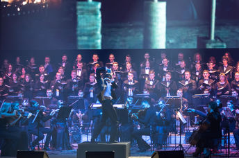 Choral group performs on stage