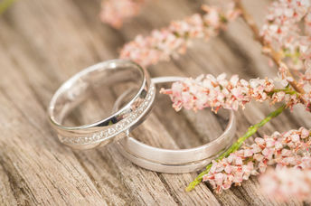 Close-up on wedding rings.
