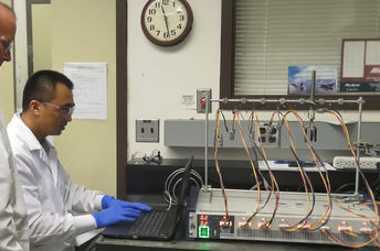 NASA researchers working on the solid state battery.